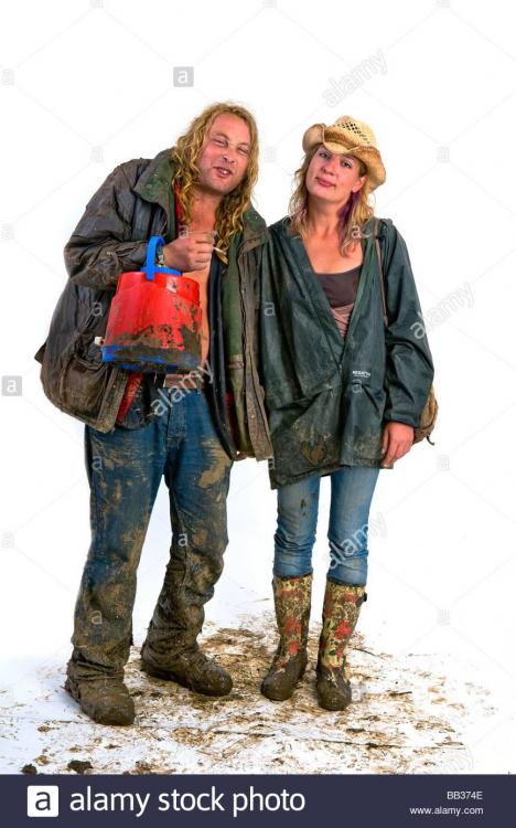 a-couple-wearing-fancy-dress-at-glastonbury-festival-uk-BB374E.jpg