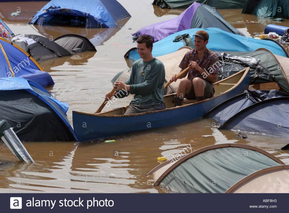 two-men-canoeing-around-the-flooded-pennard-hill-campsite-glastonbury-ABF8H3.thumb.jpg.d2254b7982ee4ad61a5db11008d855d9.jpg