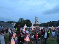 around the festival site procession and fire show)