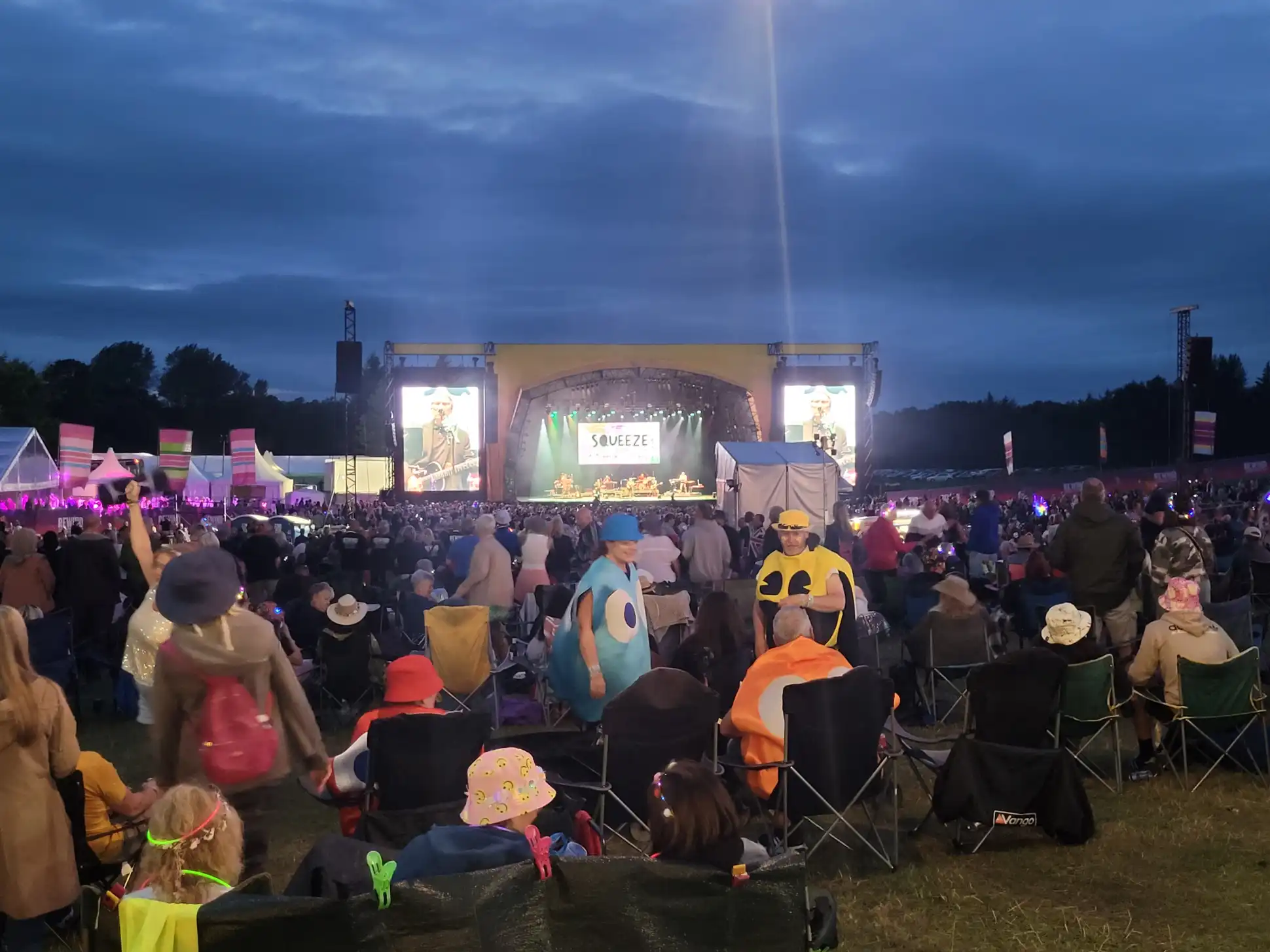 A crowd of happy festival goers enjoy the Sunday headliner, Squeeze at Rewind Festival North 2024