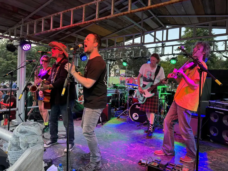 Davy Cowan and the Storm Chasers play on a small, cozy stage at Belladrum