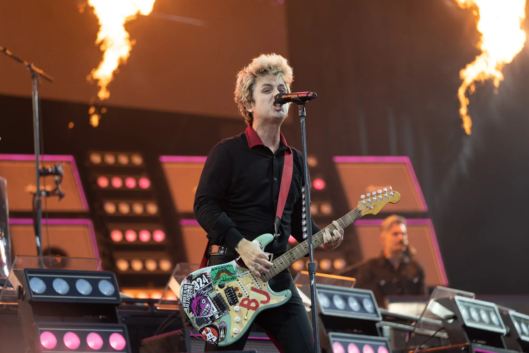Green Day performing at the Isle of Wight Festival 2024 surrounded by pyrotechnics