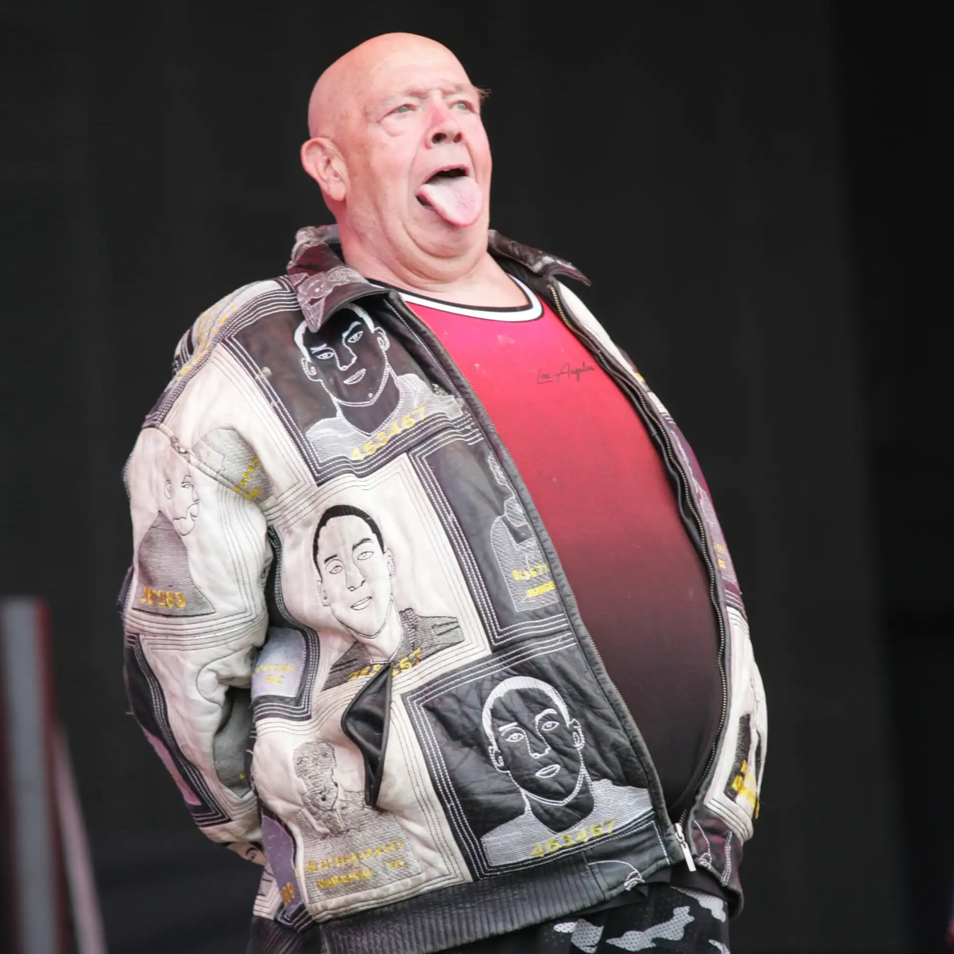 Bad Manners frontman sticking out his tongue in his trademark fashion at Rewind Festival North 2024